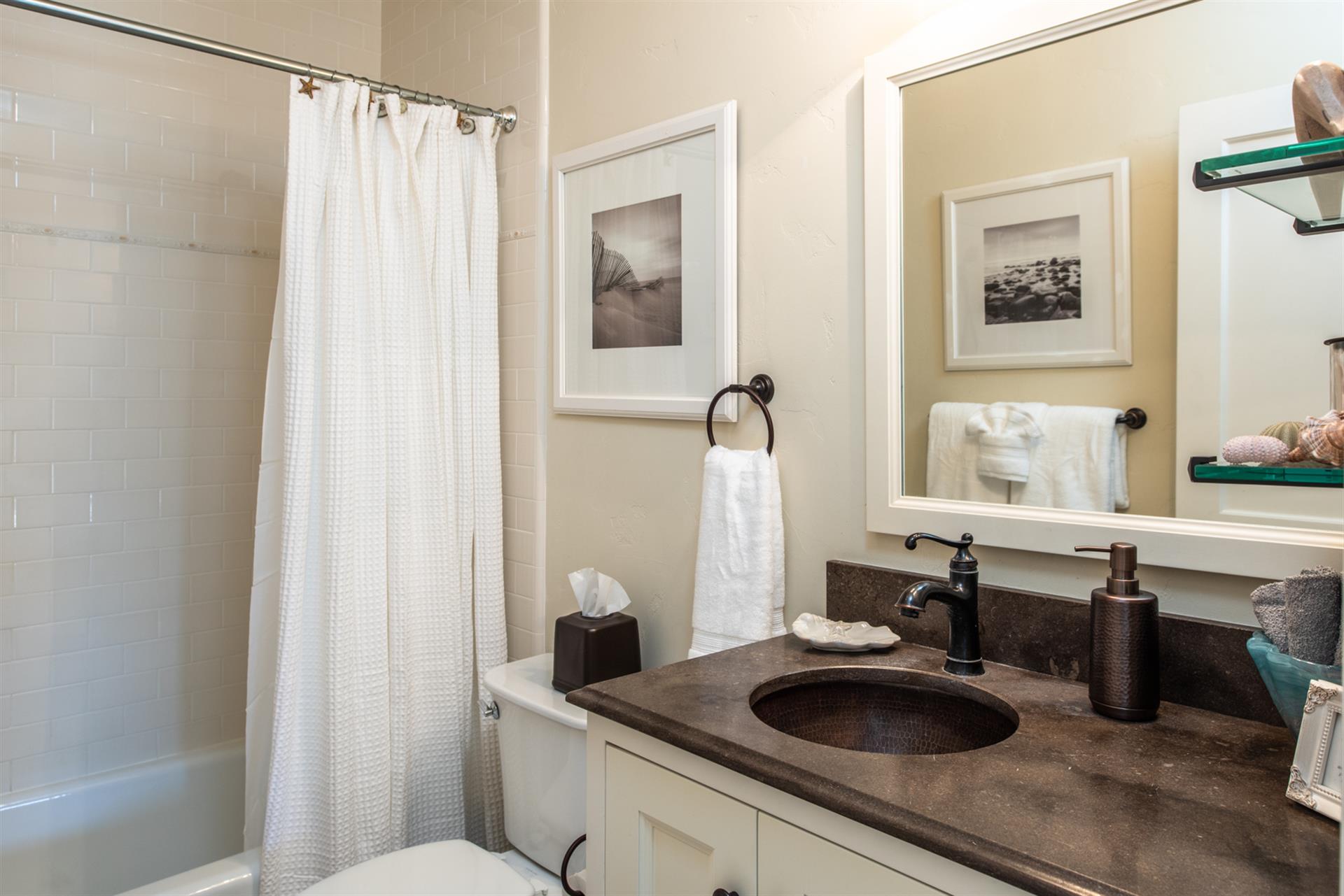HallwayAccessed Bathroom with Shower Over Tub