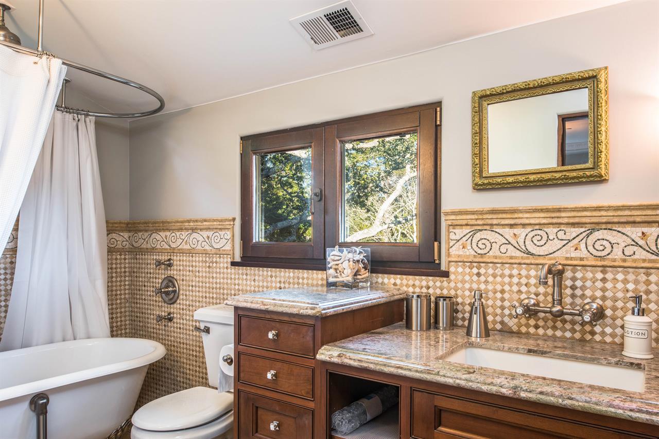 Upstairs En Suite Bathroom with Shower Over a ClawFoot Tub