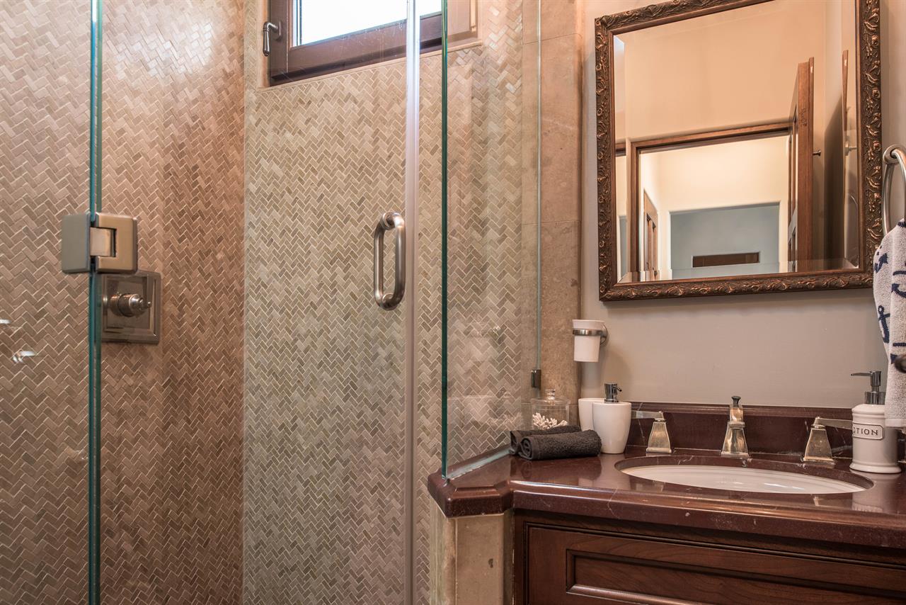 Downstairs Guest Bathroom with a Shower