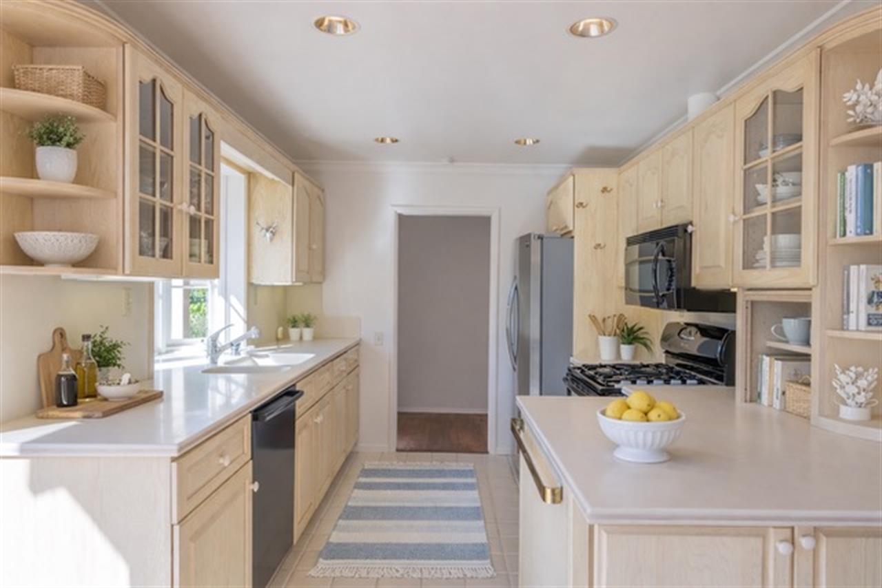 Kitchen  Staged  home will be unfurnished