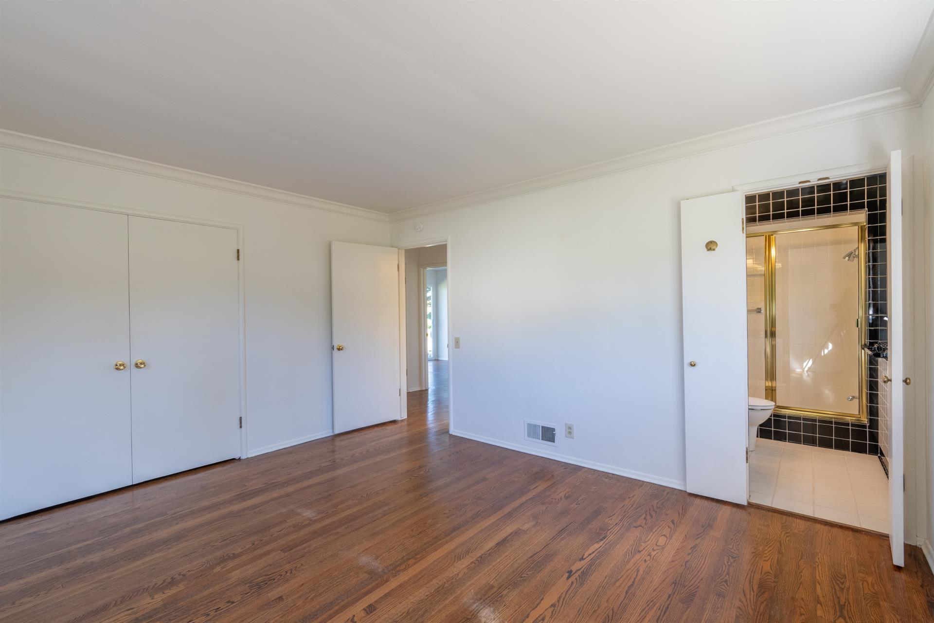 Bedroom 1 has an EnSuite Bath with a Shower