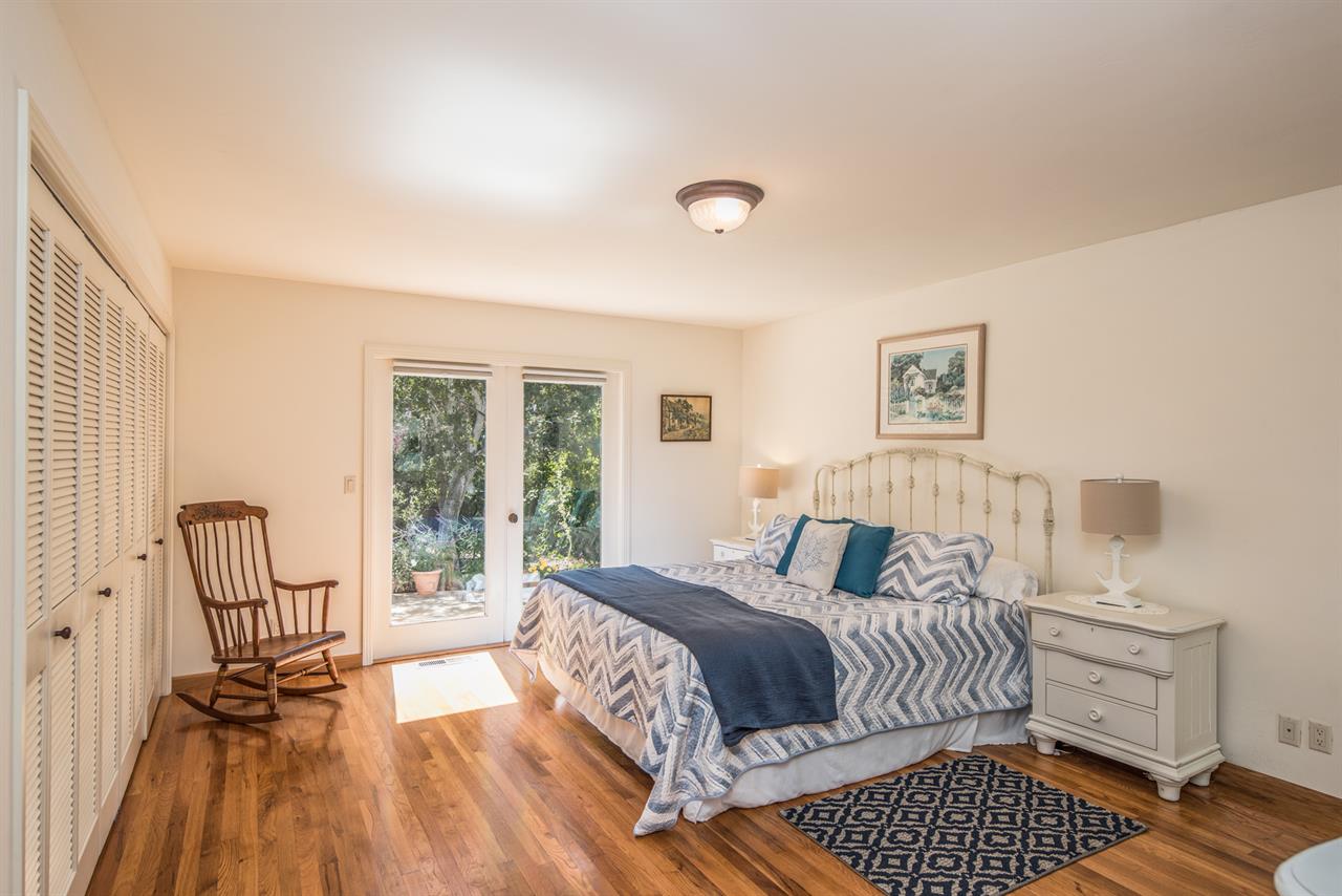 Bedroom 1  King Bed, EnSuite Bath, Patio Access