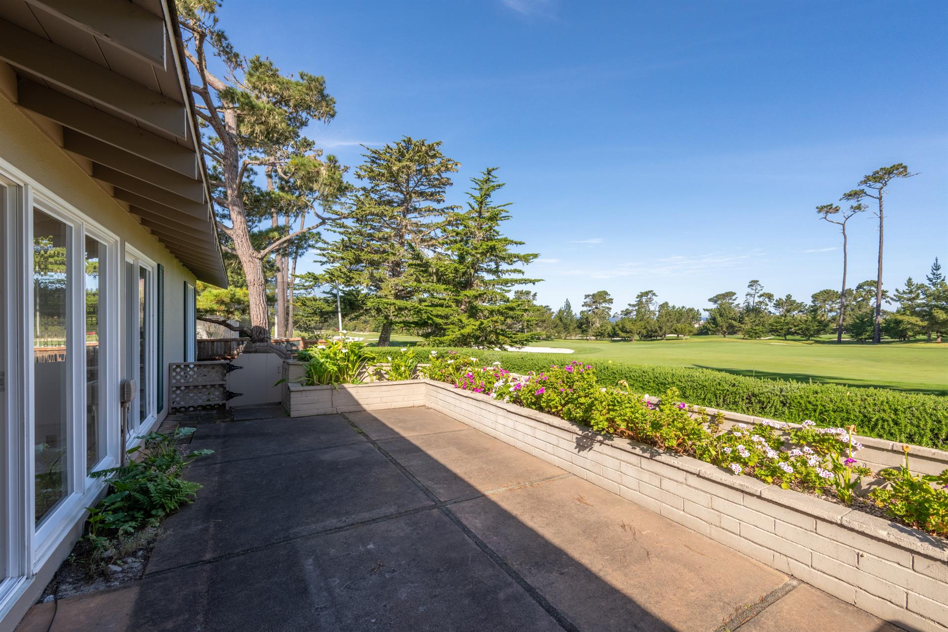 Back Patio has a Fairway and Distant Ocean View