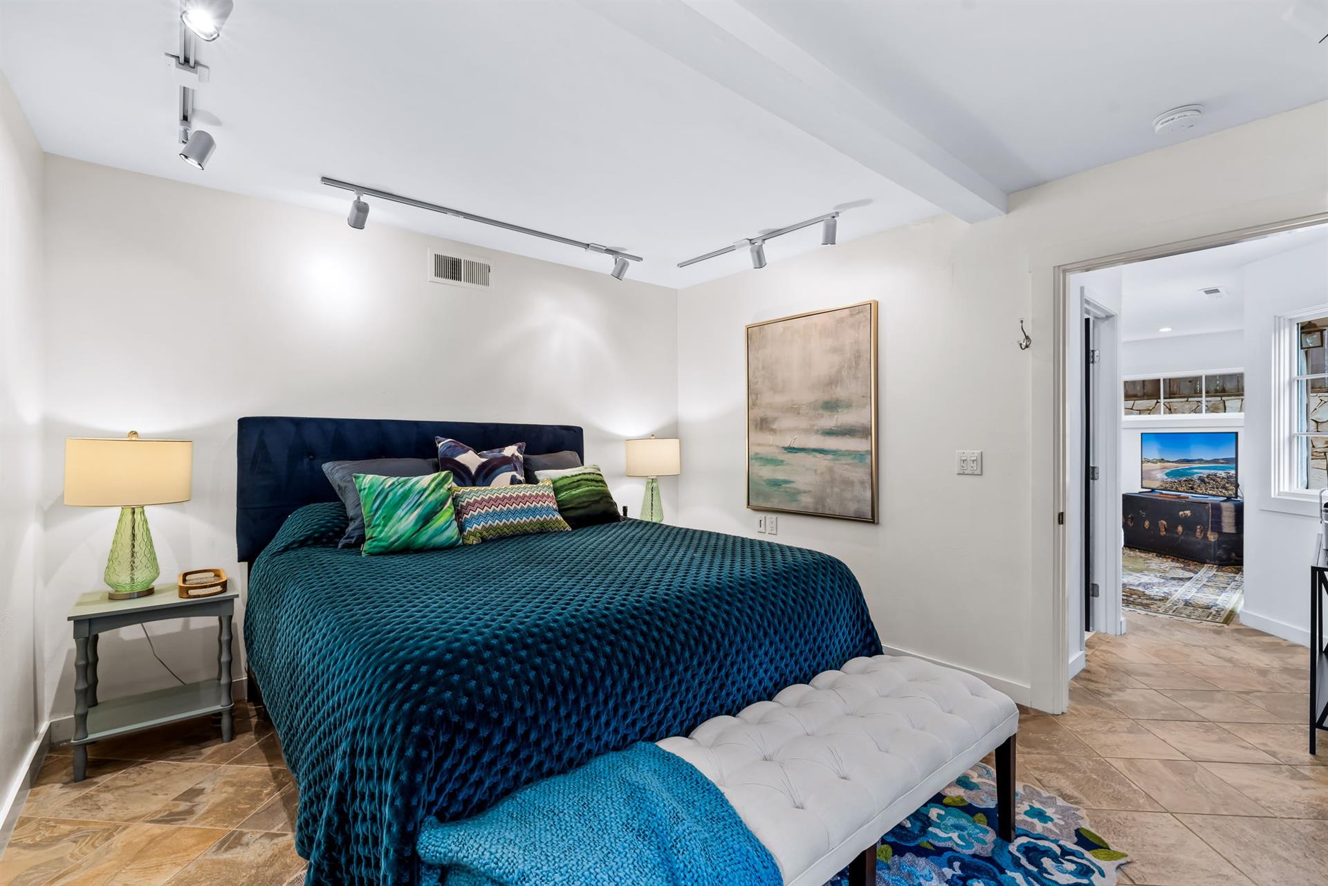 Bedroom 4  CA King Bed, TV, EnSuite Bath with a Shower