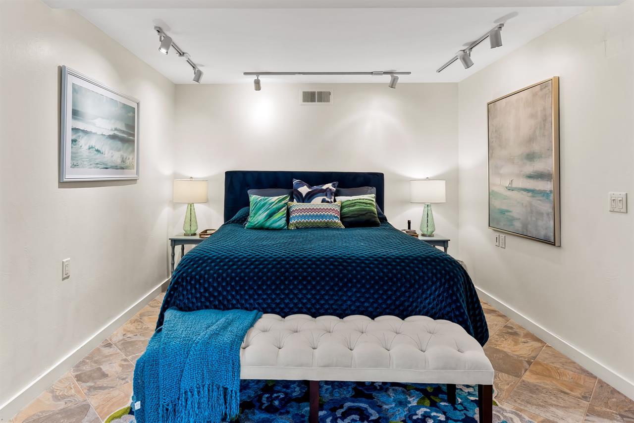 Bedroom 4  CA King Bed, TV, EnSuite Bath with a Shower