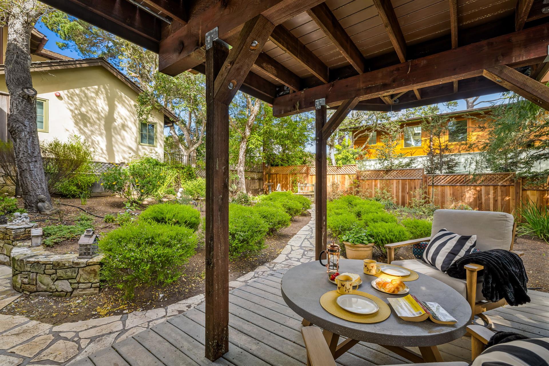 Backyard with a Covered Patio Seating Area