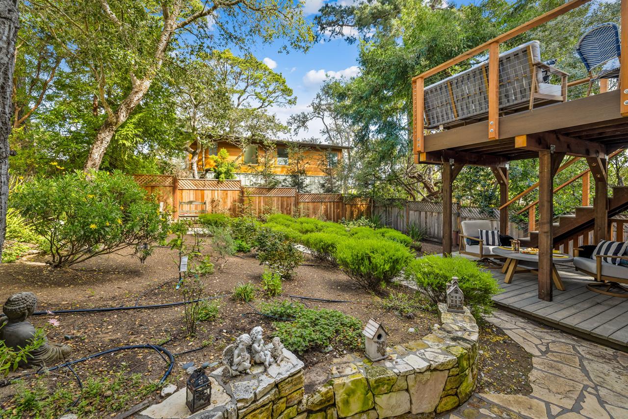 Backyard with a Covered Patio Seating Area