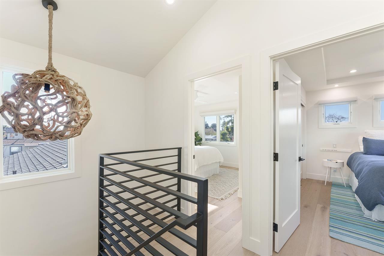 Heading Upstairs  Bedrooms 2 and 3 have Queen Beds