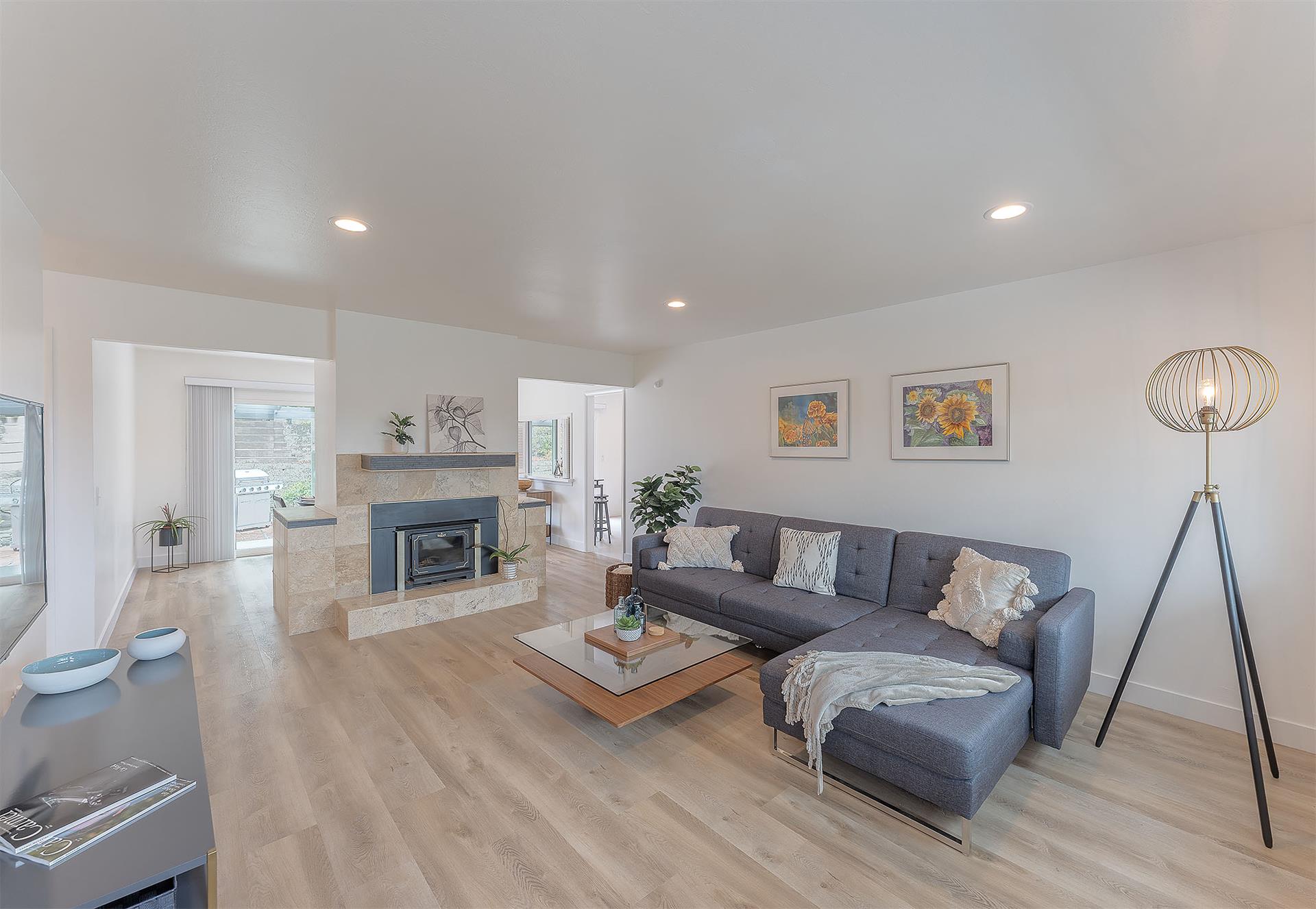 Living Room has a Candlelit Fireplace and HDTV