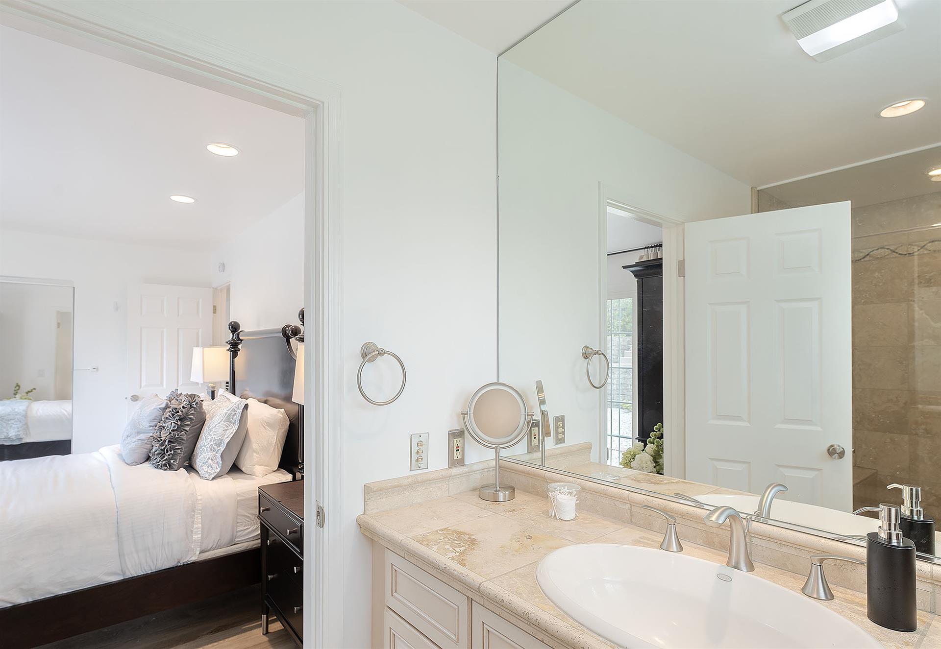 Bedroom 1  Queen Bed, En Suite with Steam Shower