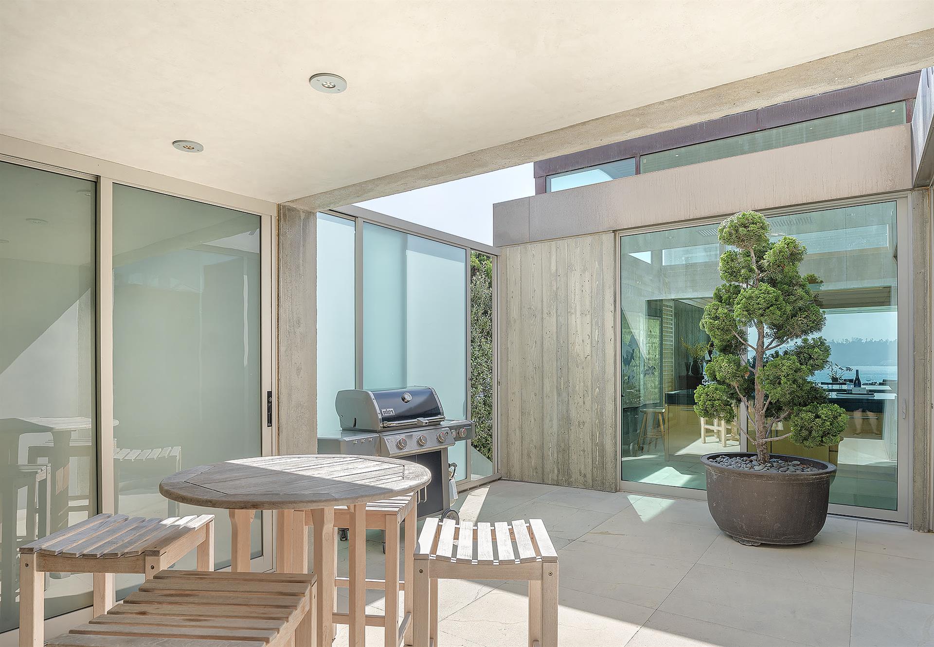 Middle Courtyard with Gas Grill Near Kitchen