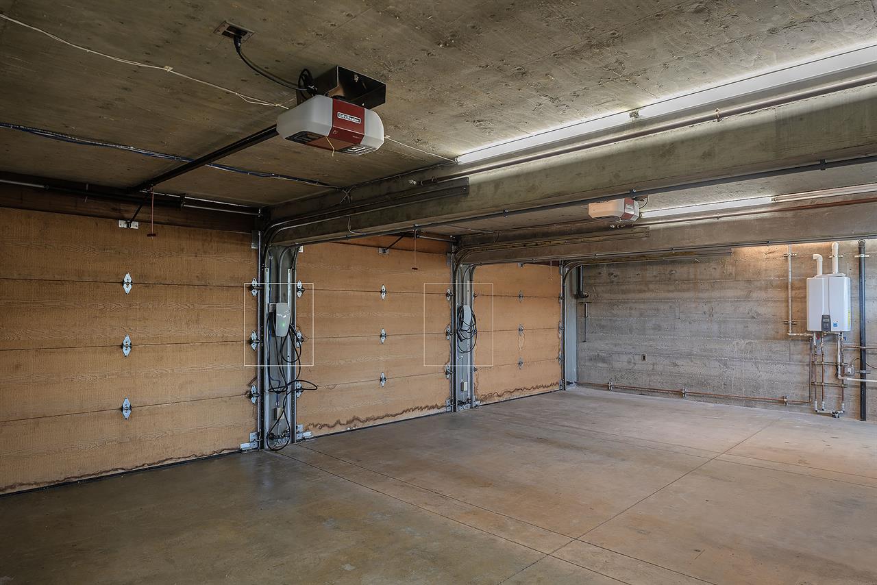 Garage has Two EV Chargers