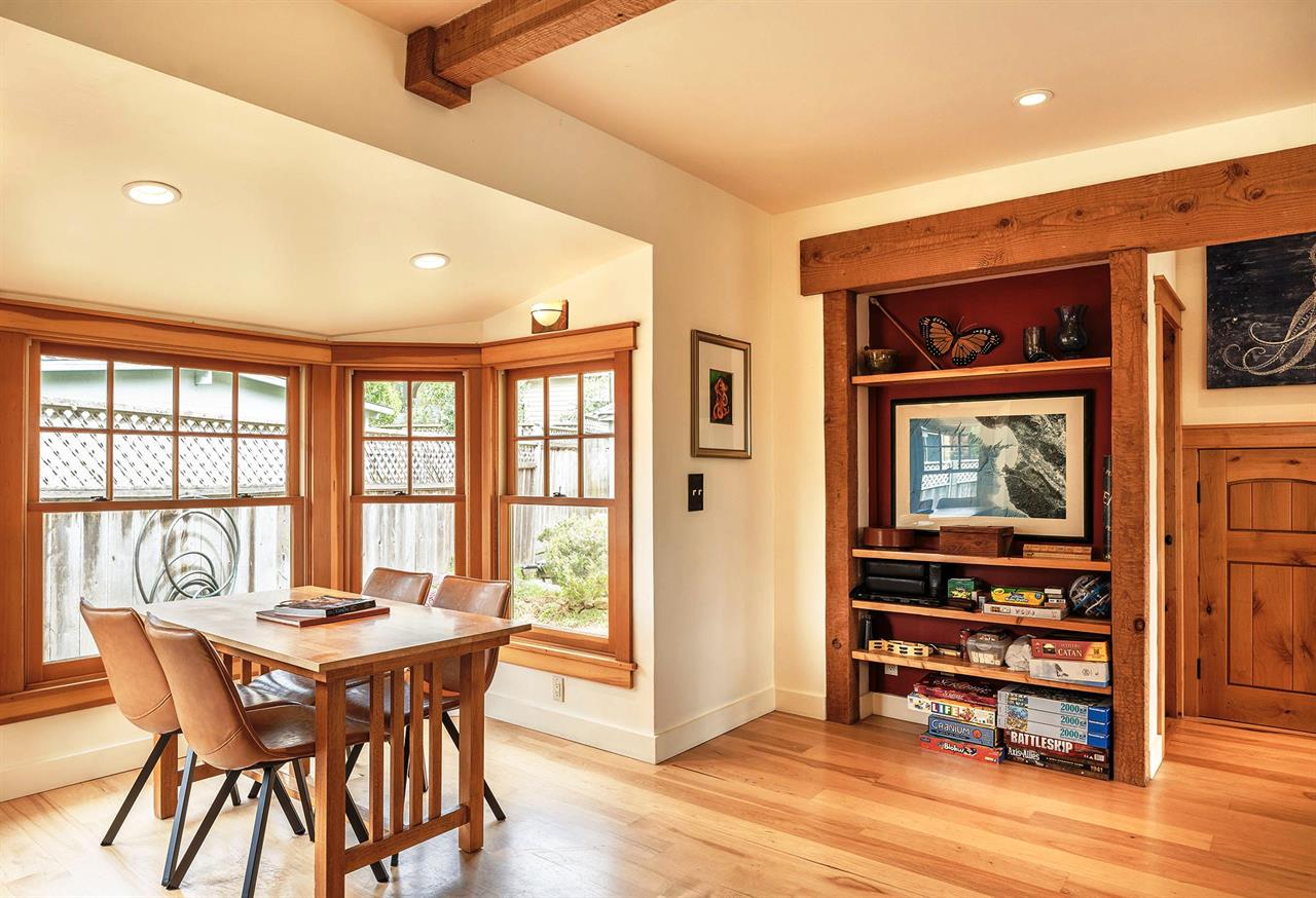 Living Room has a Game Table with Lots of Fun Games