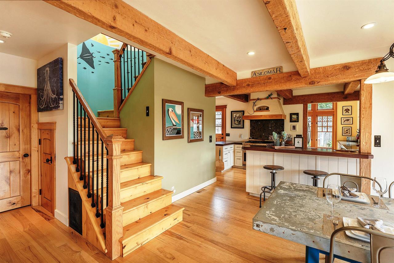 Heading Upstairs  Beautiful Wood Floors and Exposed Beams
