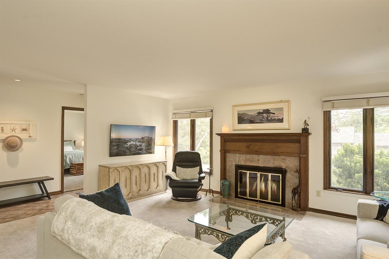 Living Room has TV with Cable Service and a Gas Fireplace