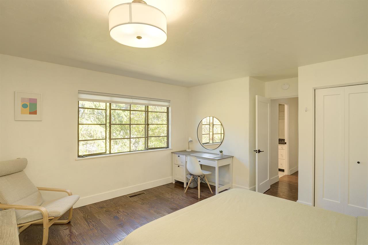 Bedroom 2  Queen Bed and a Small Desk