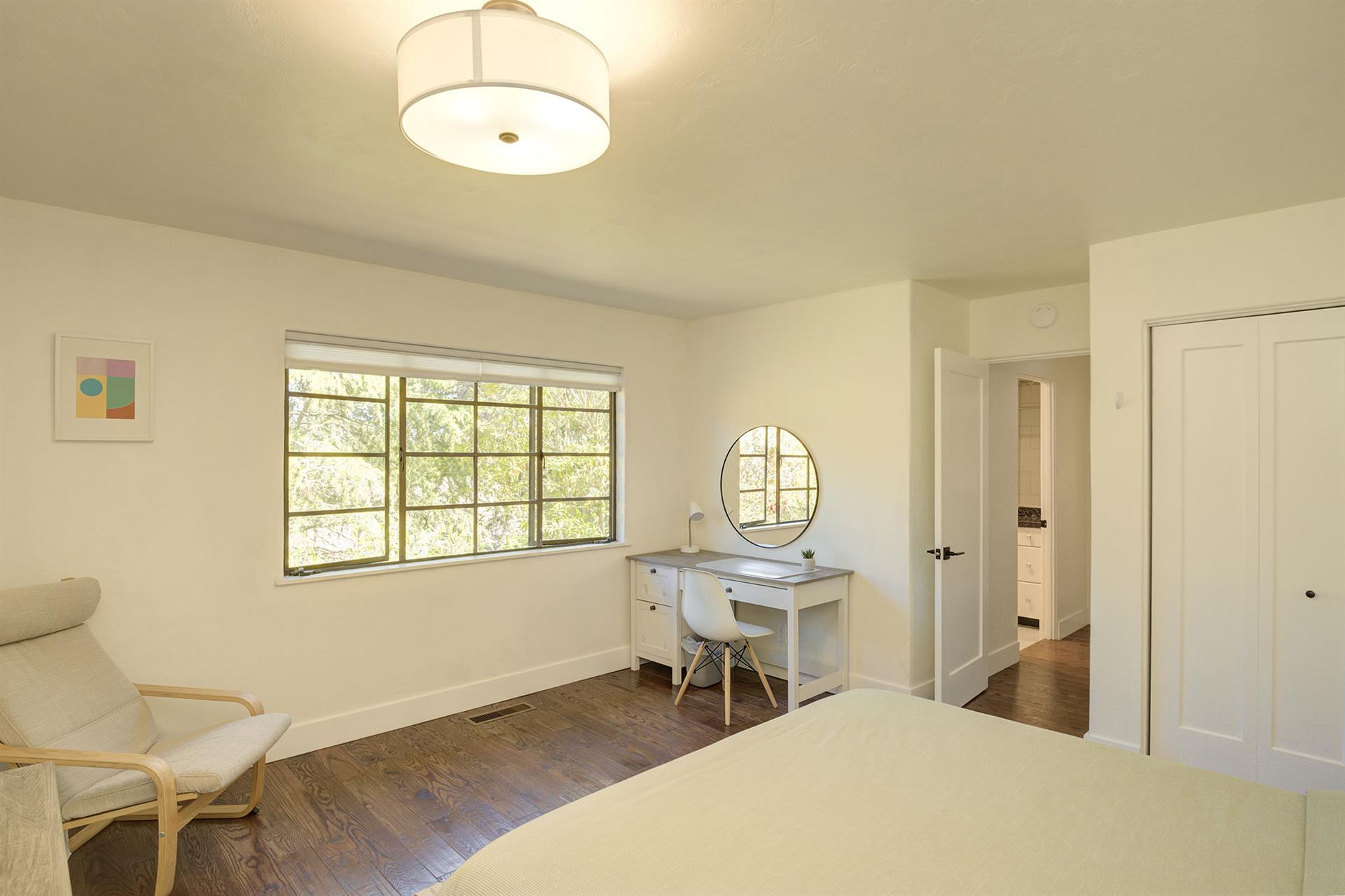 Bedroom 2  Queen Bed and a Small Desk