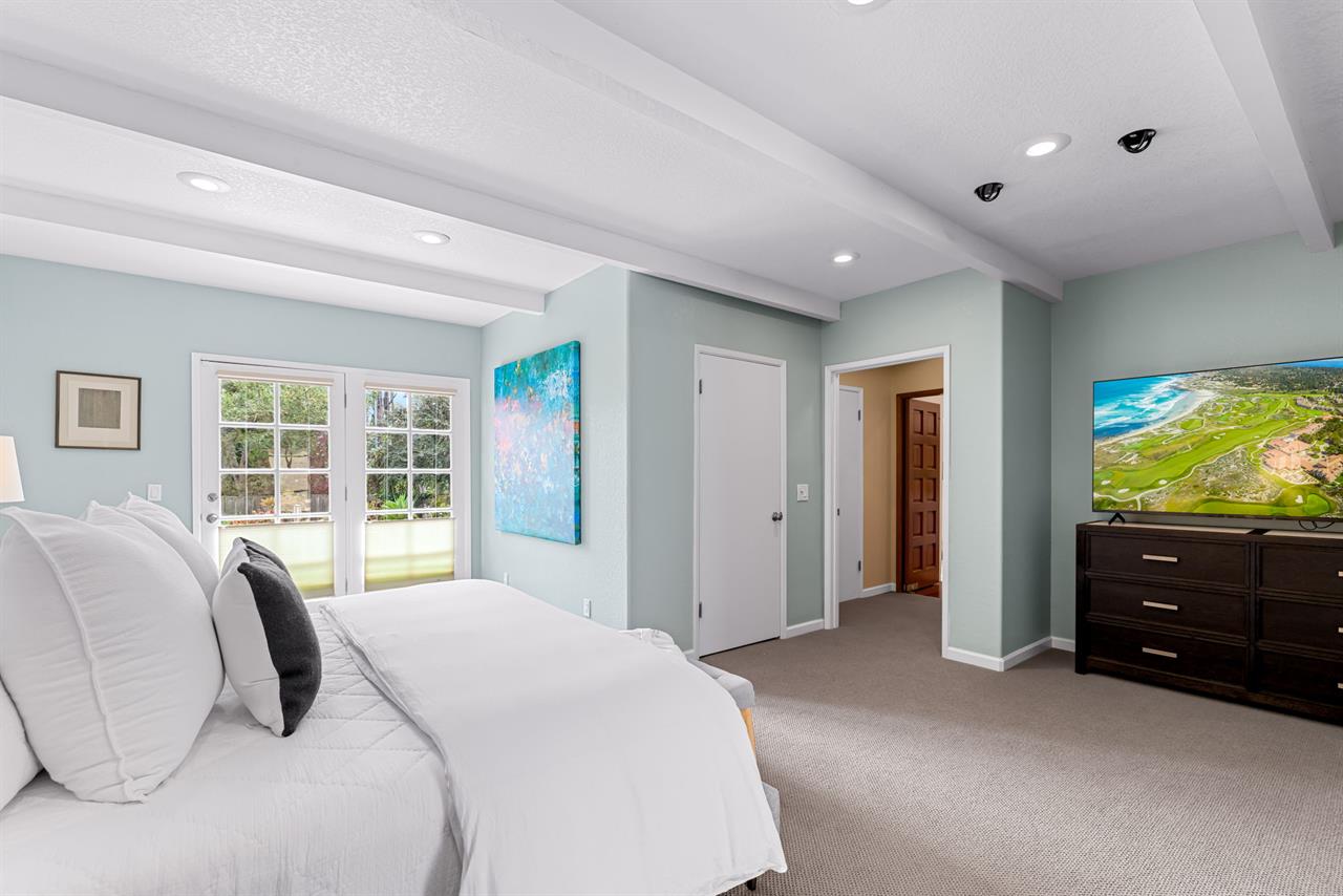 Bedroom 1 has a King Bed, EnSuite Bath, TV With Streaming