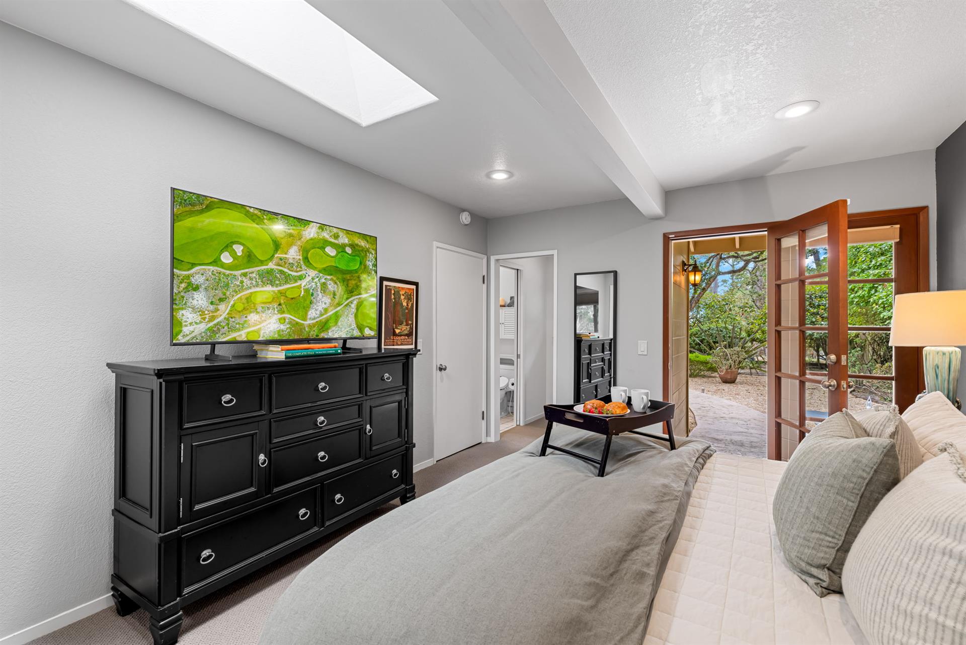 Bedroom 2 has a King Bed and a TV with Streaming