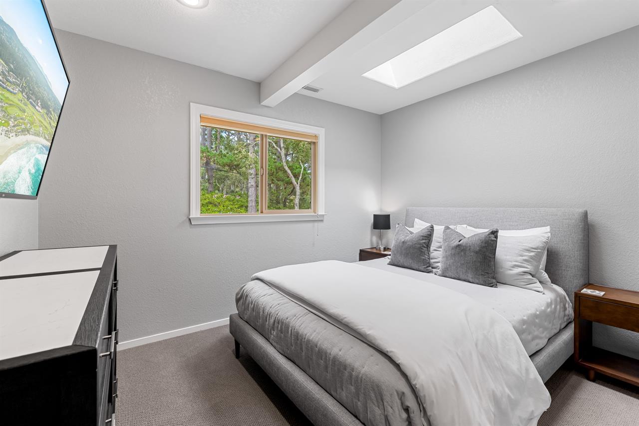 Bedroom 3 has a Queen Bed and a TV with Streaming