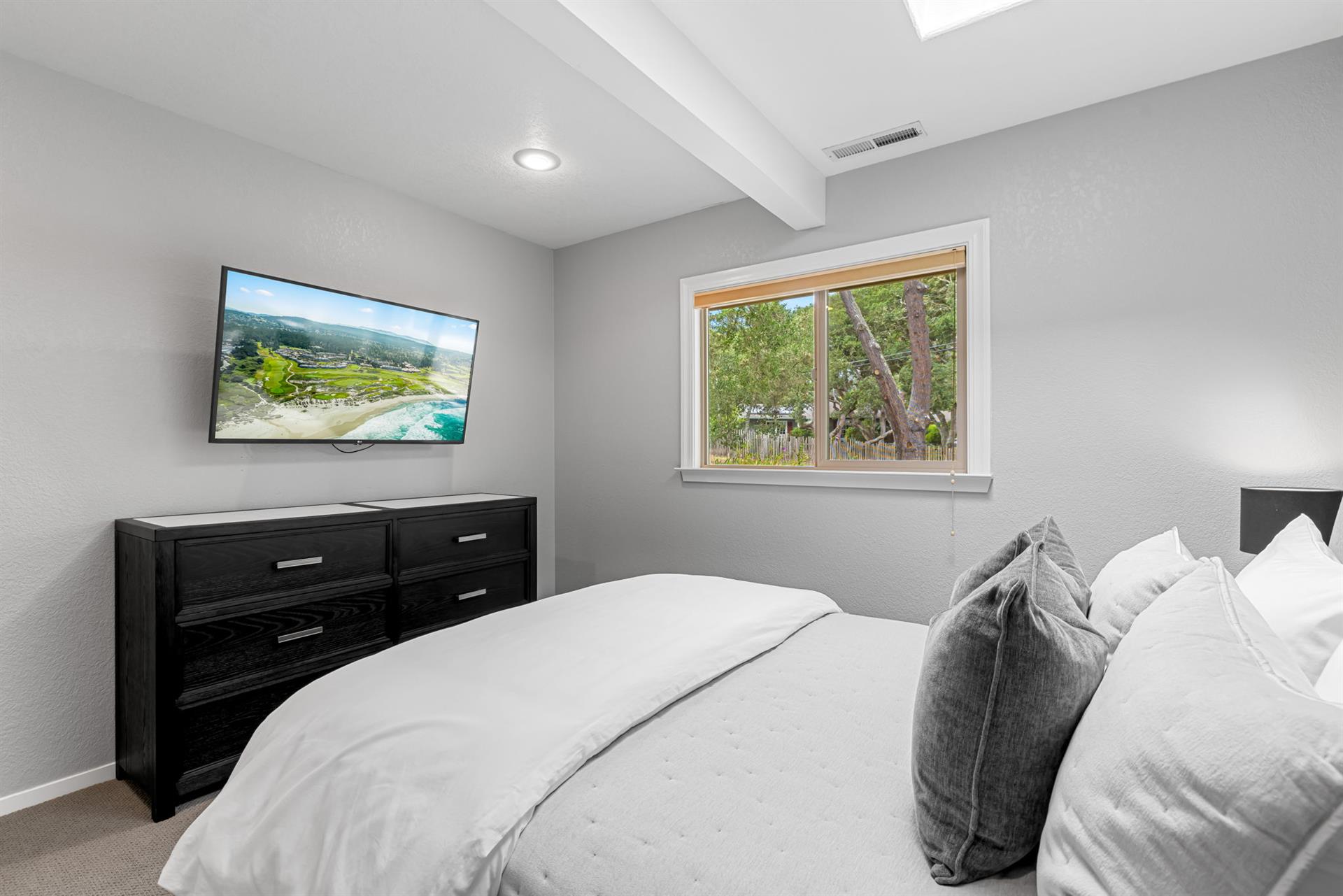 Bedroom 3 has a Queen Bed and a TV with Streaming