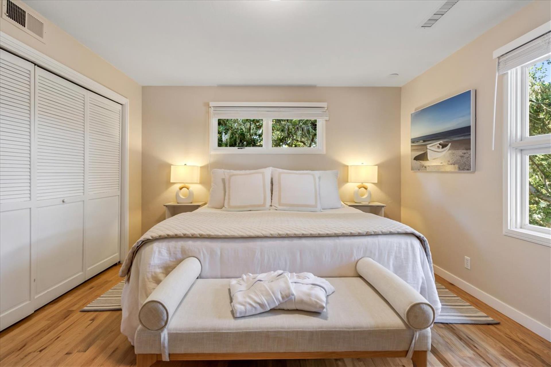 Bedroom 1 has a King Bed and EnSuite Bath with a Shower