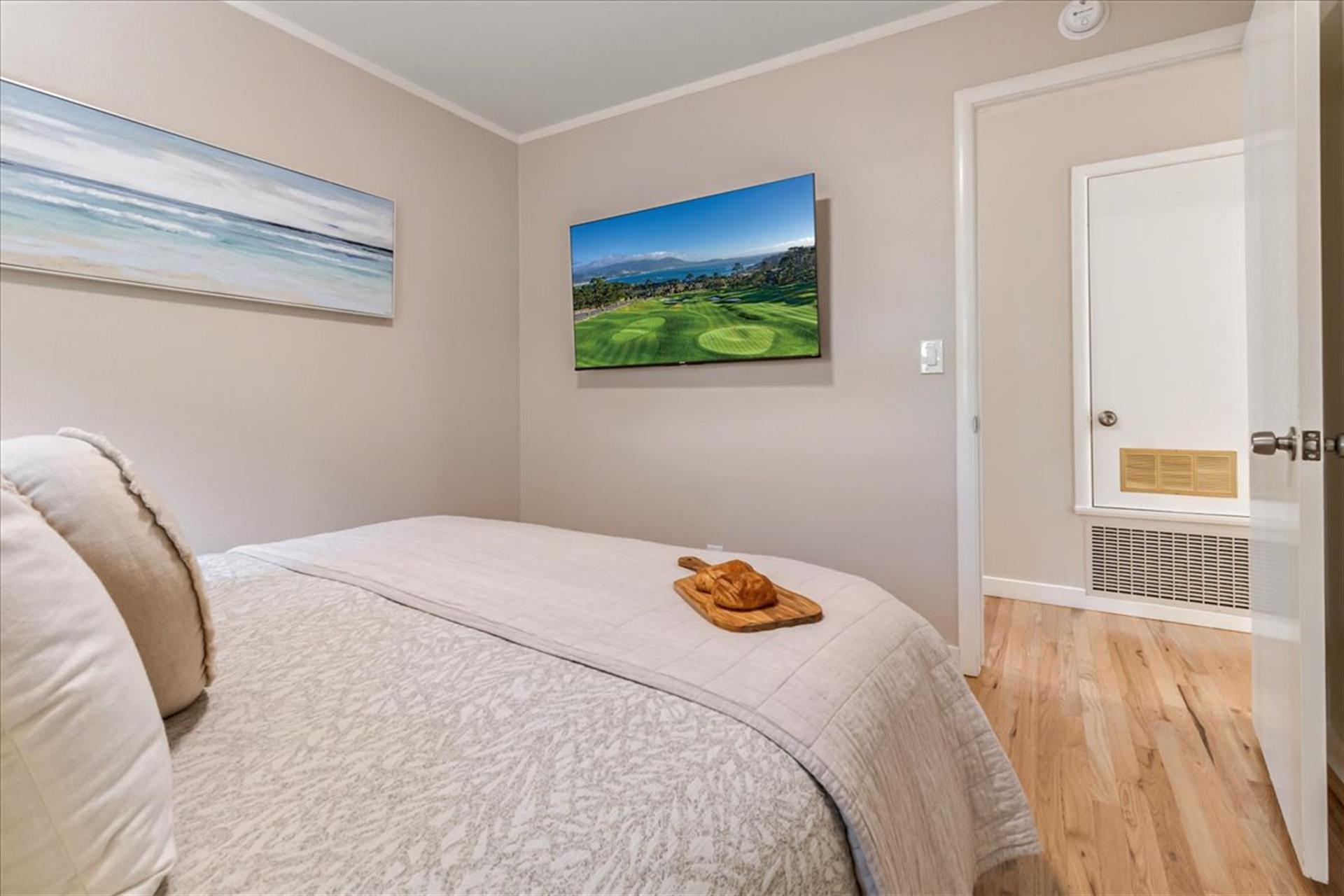 Bedroom 3 has a Queen Bed and a TV