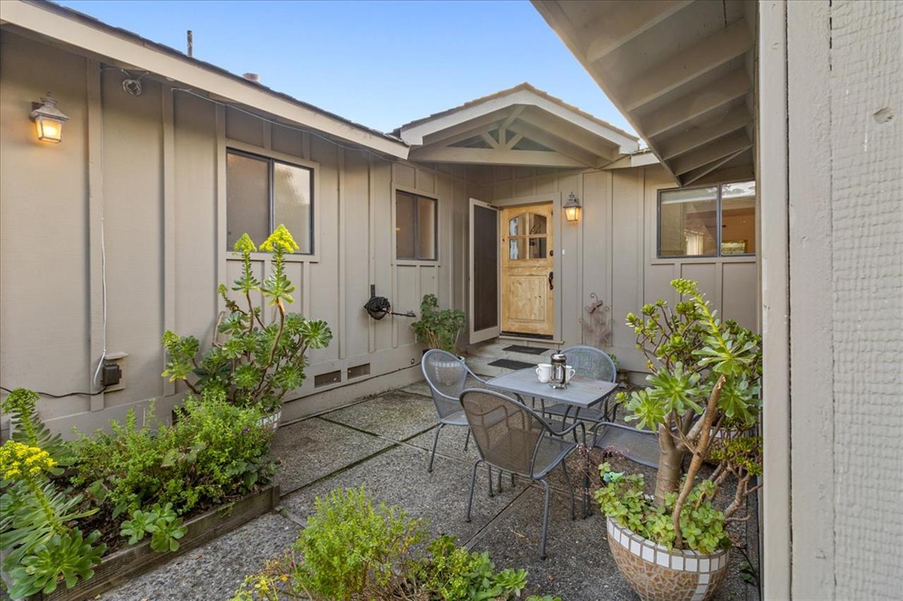 Welcoming Entry with Small Table for Outdoor Dining for Four