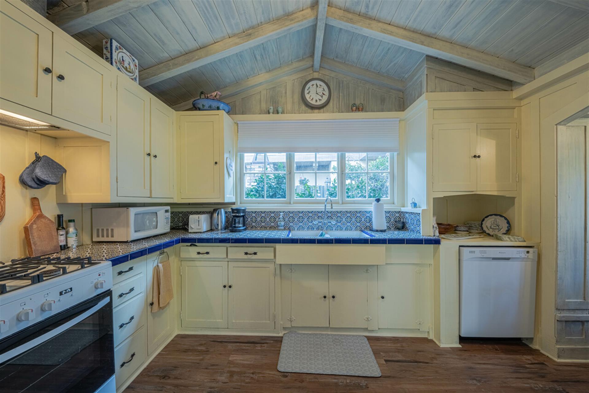 FullyEquipped Kitchen with Vaulted Ceiling