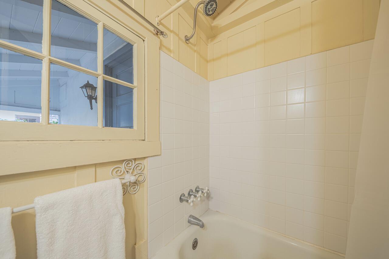 Downstairs Bathroom with ShowerOverTub, Off Family Room