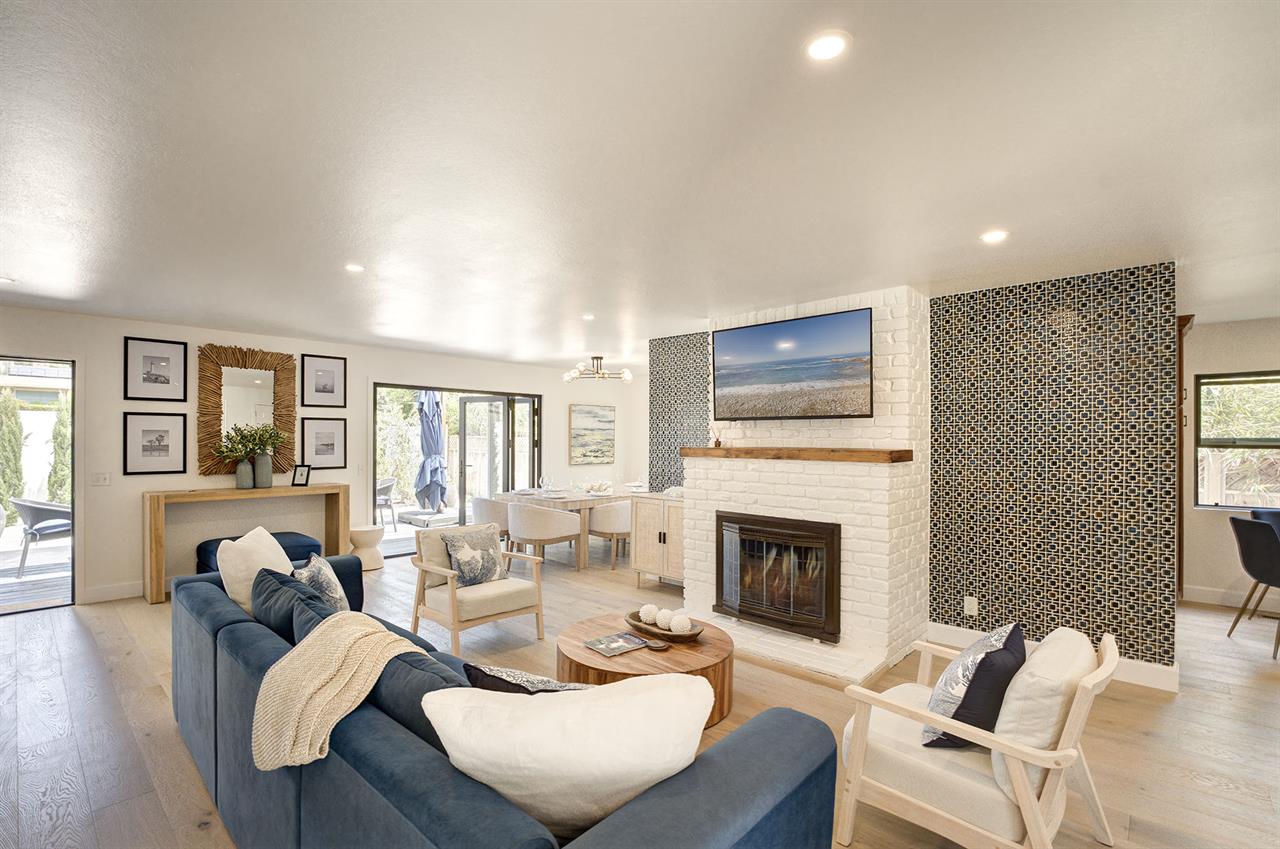 Living Room with a Fireplace and TV