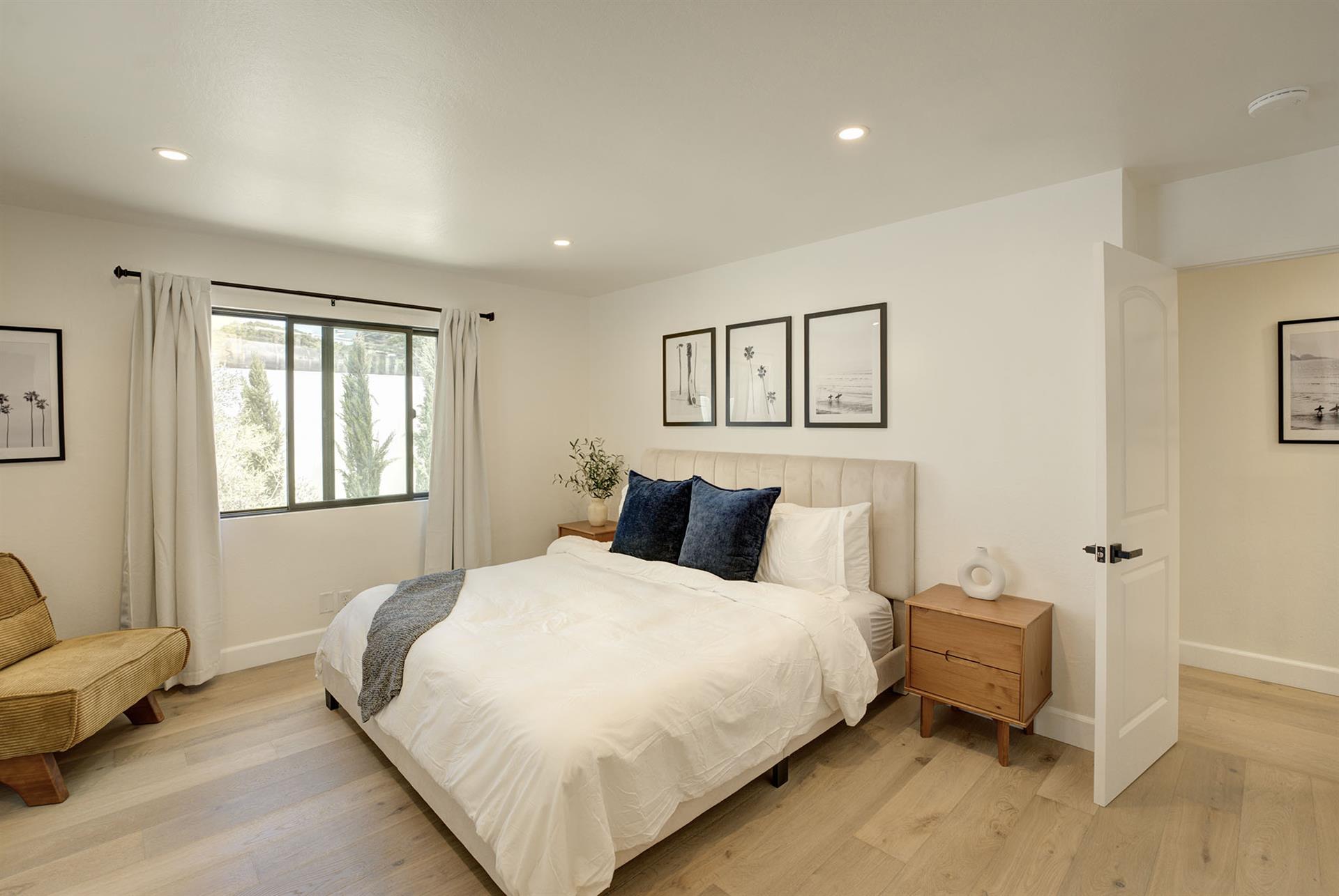 Bedroom 1 has a King Bed and EnSuite Bath with a Shower