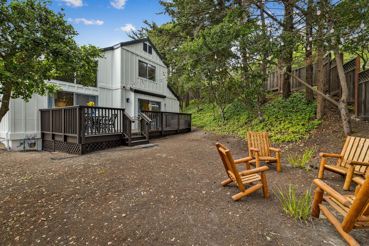 Backyard has the Dining Deck and Seating Area