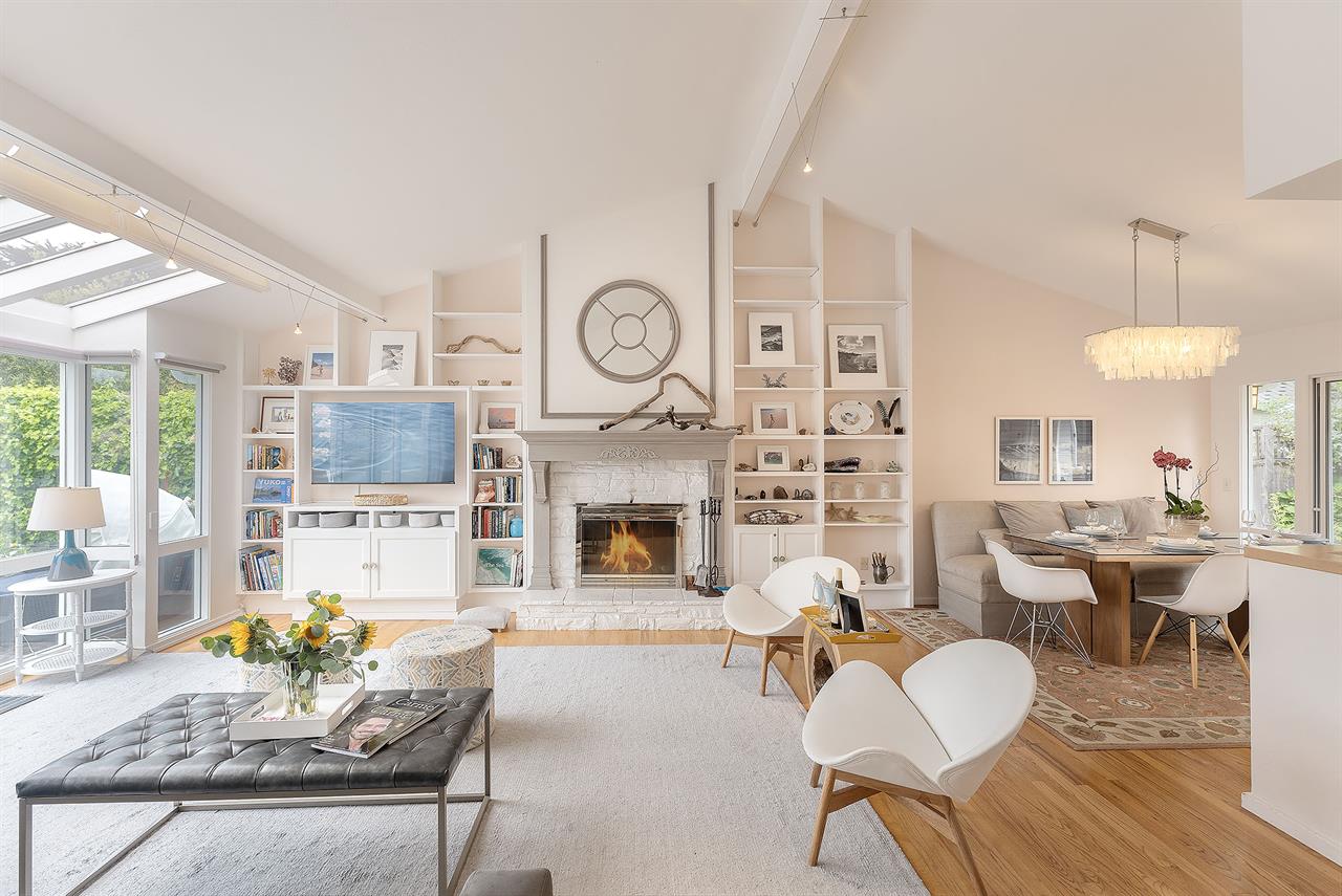 Living Room with Wood Fireplace and Smart TV