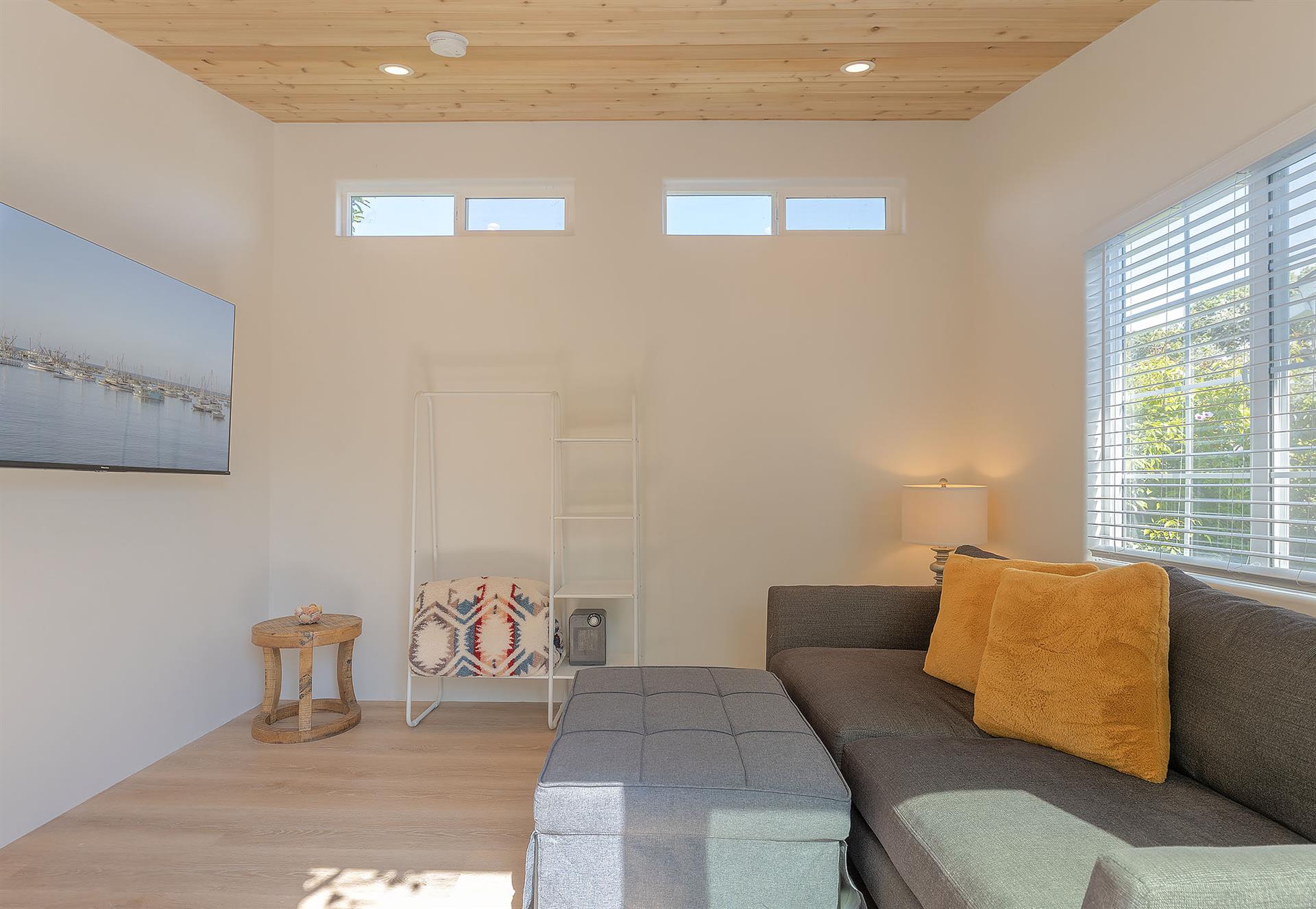 Detached Bonus Room in the Backyard has a Large Smart TV