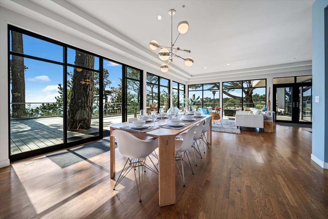 Floor to Ceiling Windows Flood the Home with Light