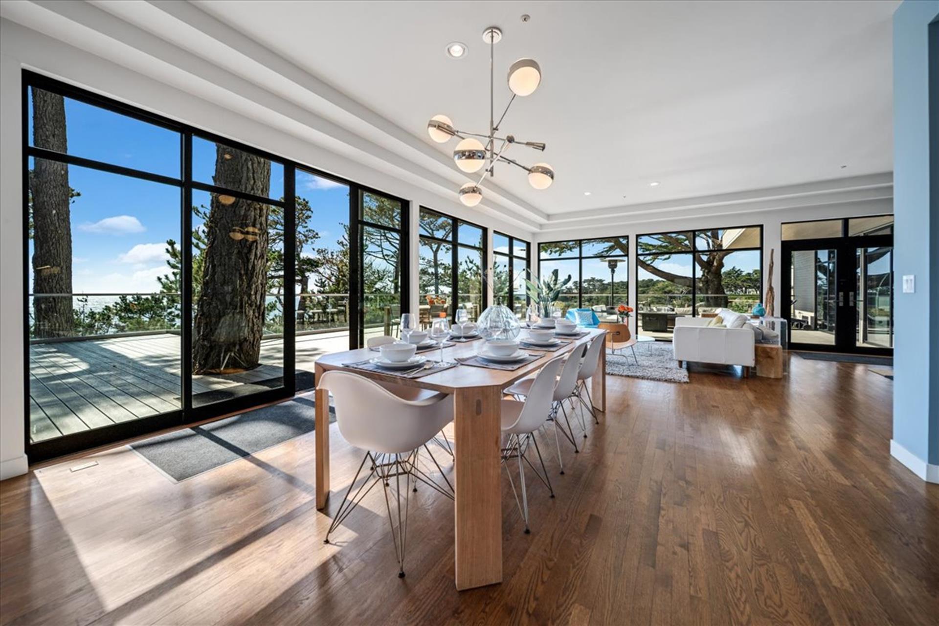 Floor to Ceiling Windows Flood the Home with Light
