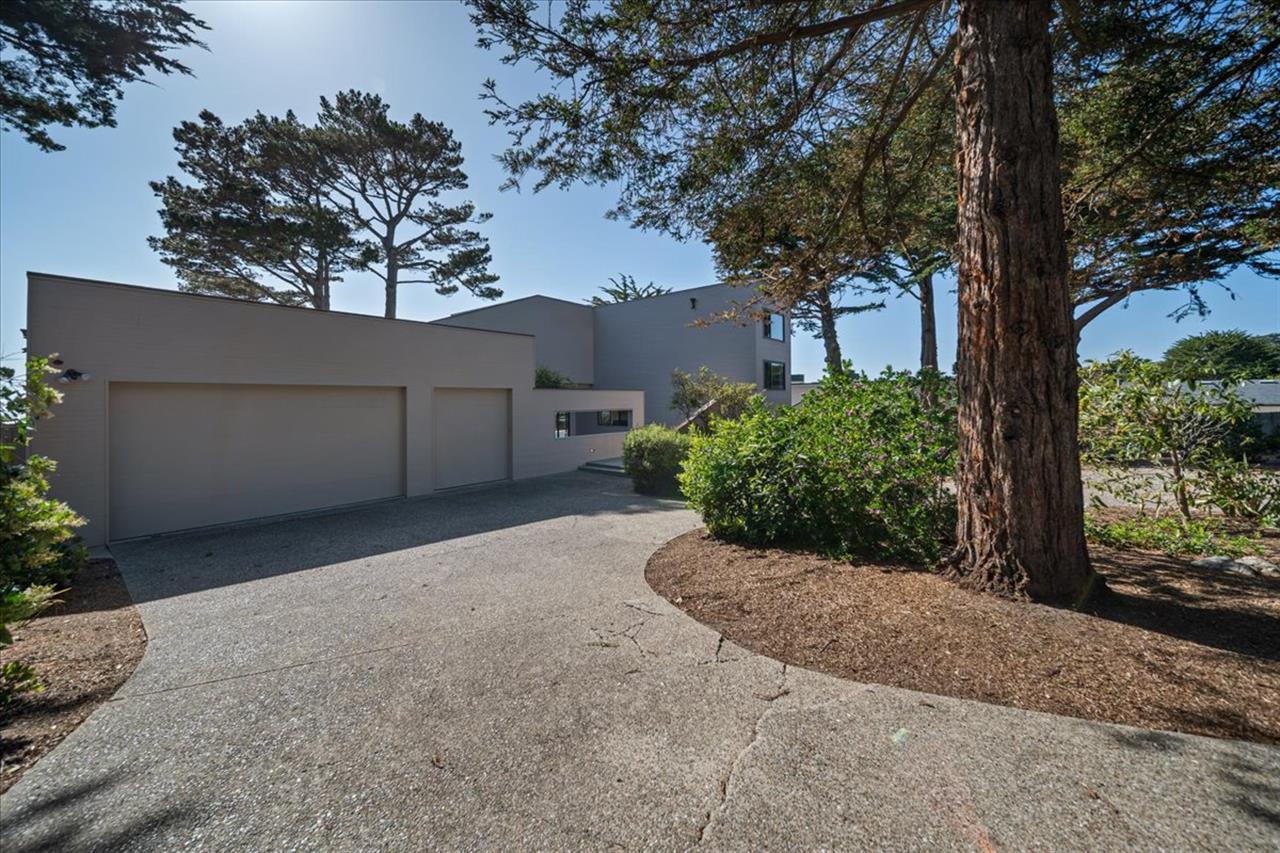 Three Car Garage Plus Lots of Driveway Parking