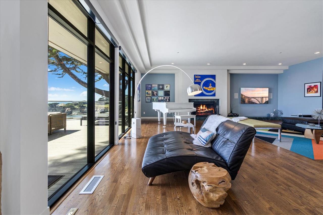 Living Room has Floor to Ceiling Windows for the Ocean View
