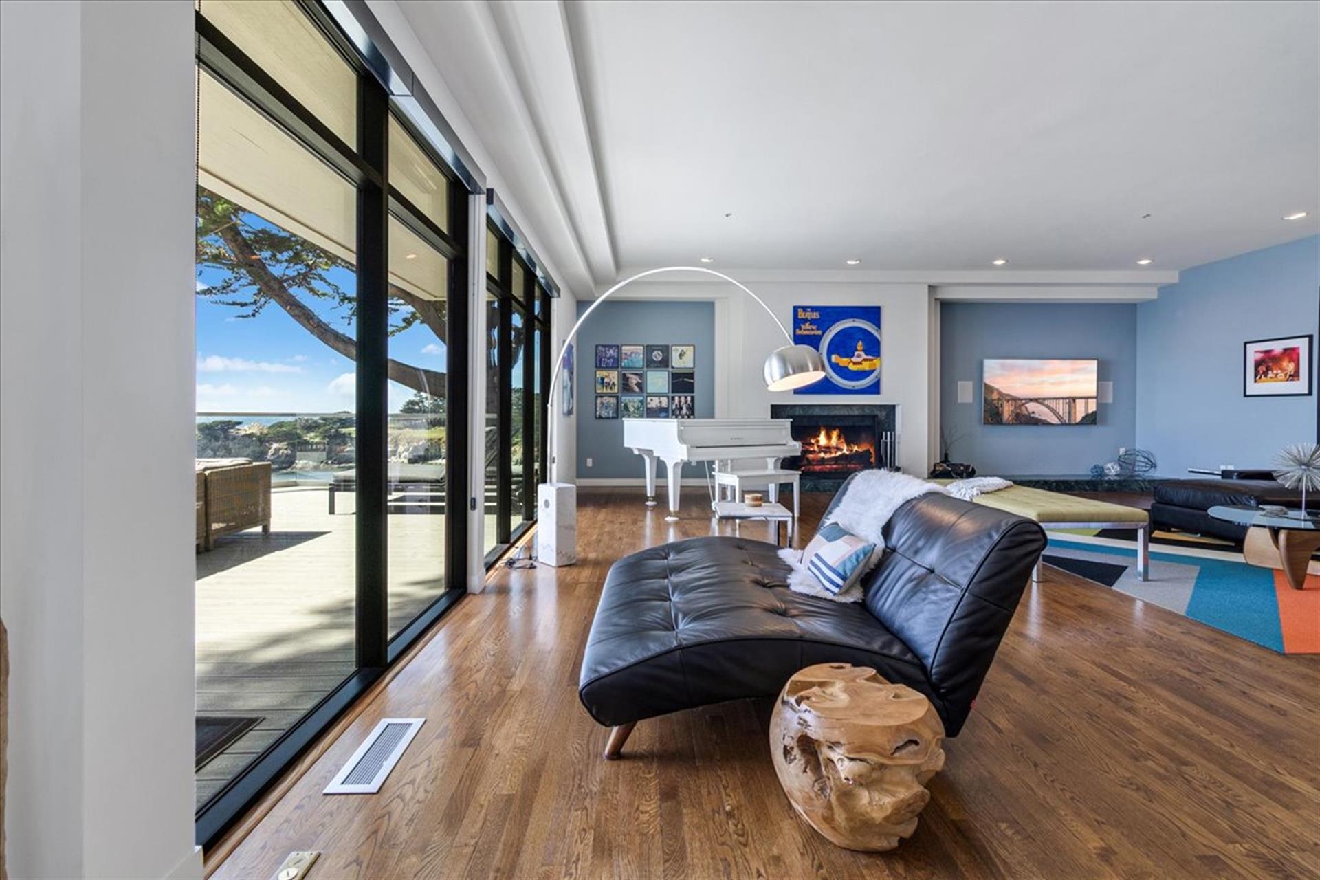Living Room has Floor to Ceiling Windows for the Ocean View