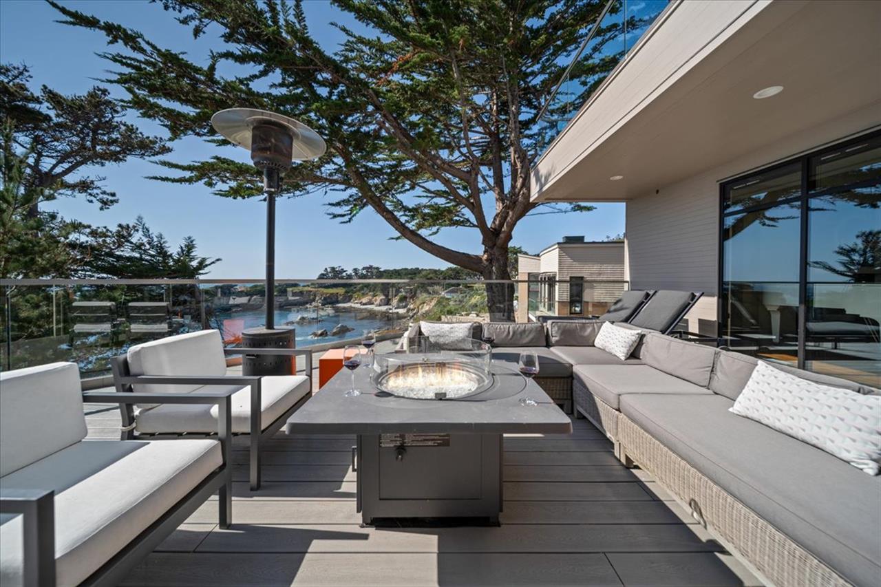 Ocean View Deck has a Seating Area with a Fire Pit and a Heater