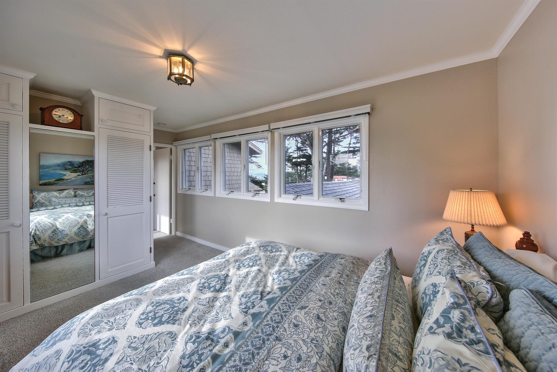 Upstairs, Bedroom 4 has a Queen Bed and Mountain Views