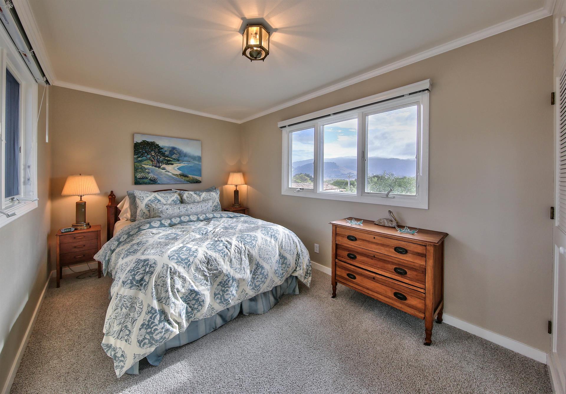 Upstairs, Bedroom 4 has a Queen Bed and Mountain Views