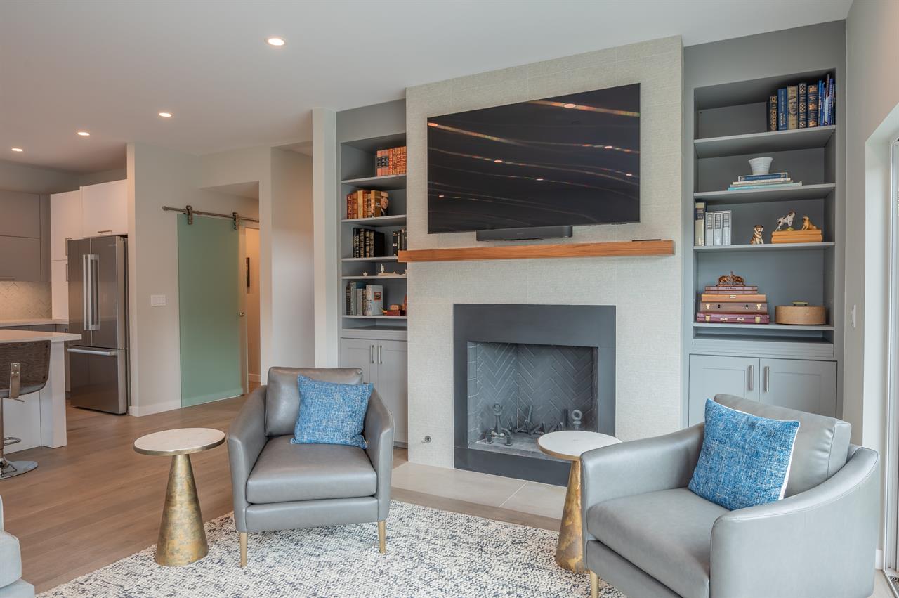 Living Room with TV, Wood Burning Fireplace, Patio Access
