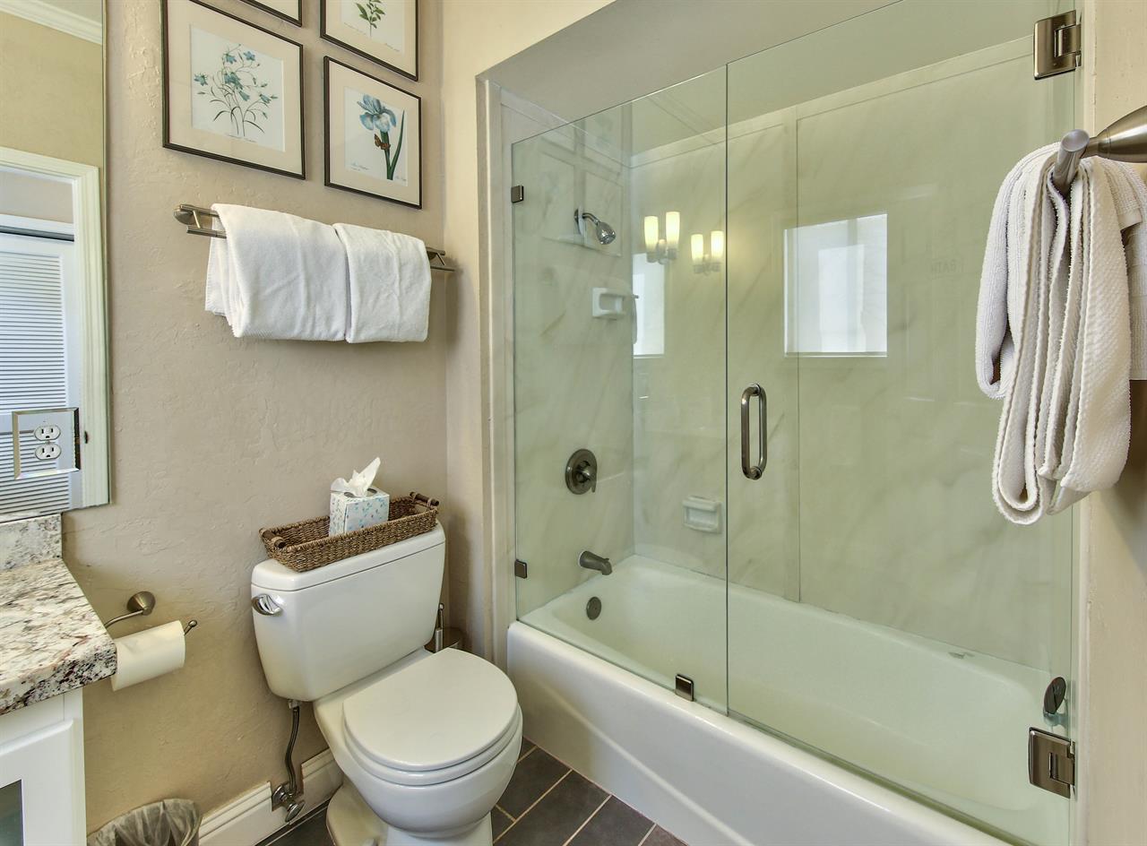 Bathroom with ShowerOverTub Combination and Glass Door