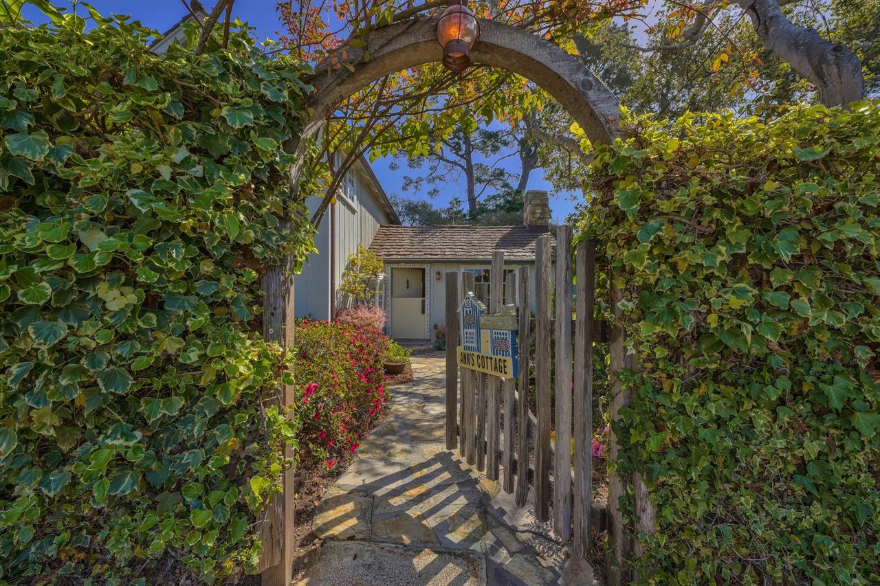 Step Under the Arbor and Enter Through the Wooden Gate