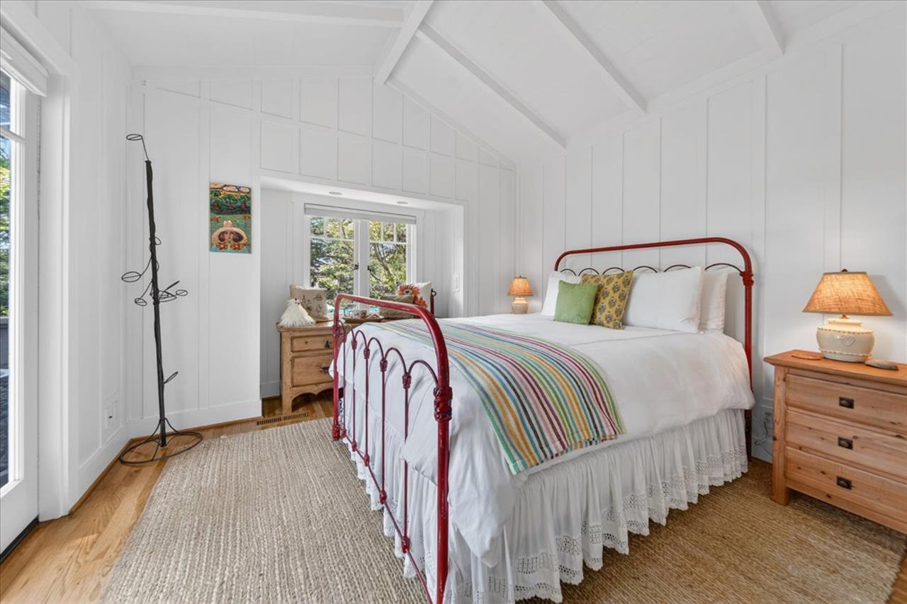 Downstairs Bedroom 2 has a Queen Bed