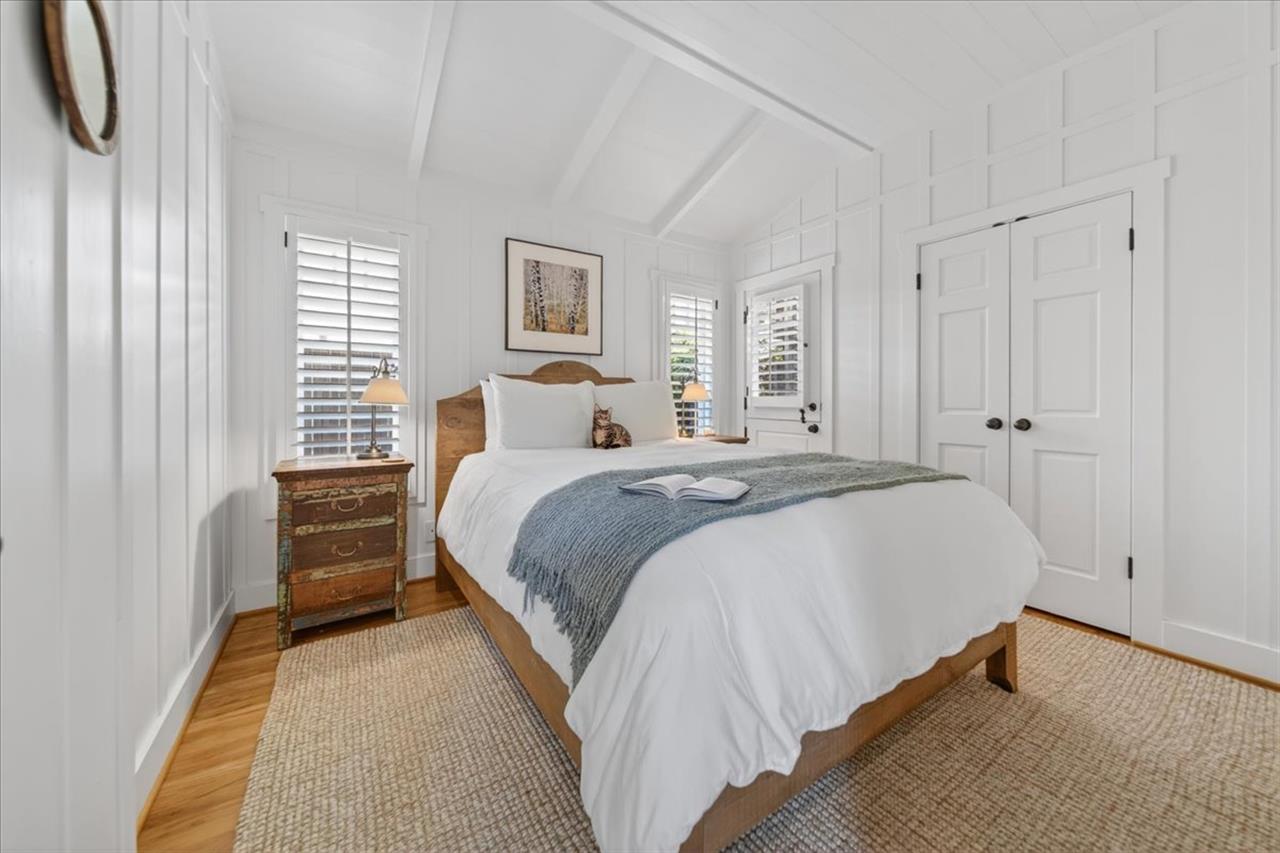 Downstairs Bedroom 3 has a Queen Bed