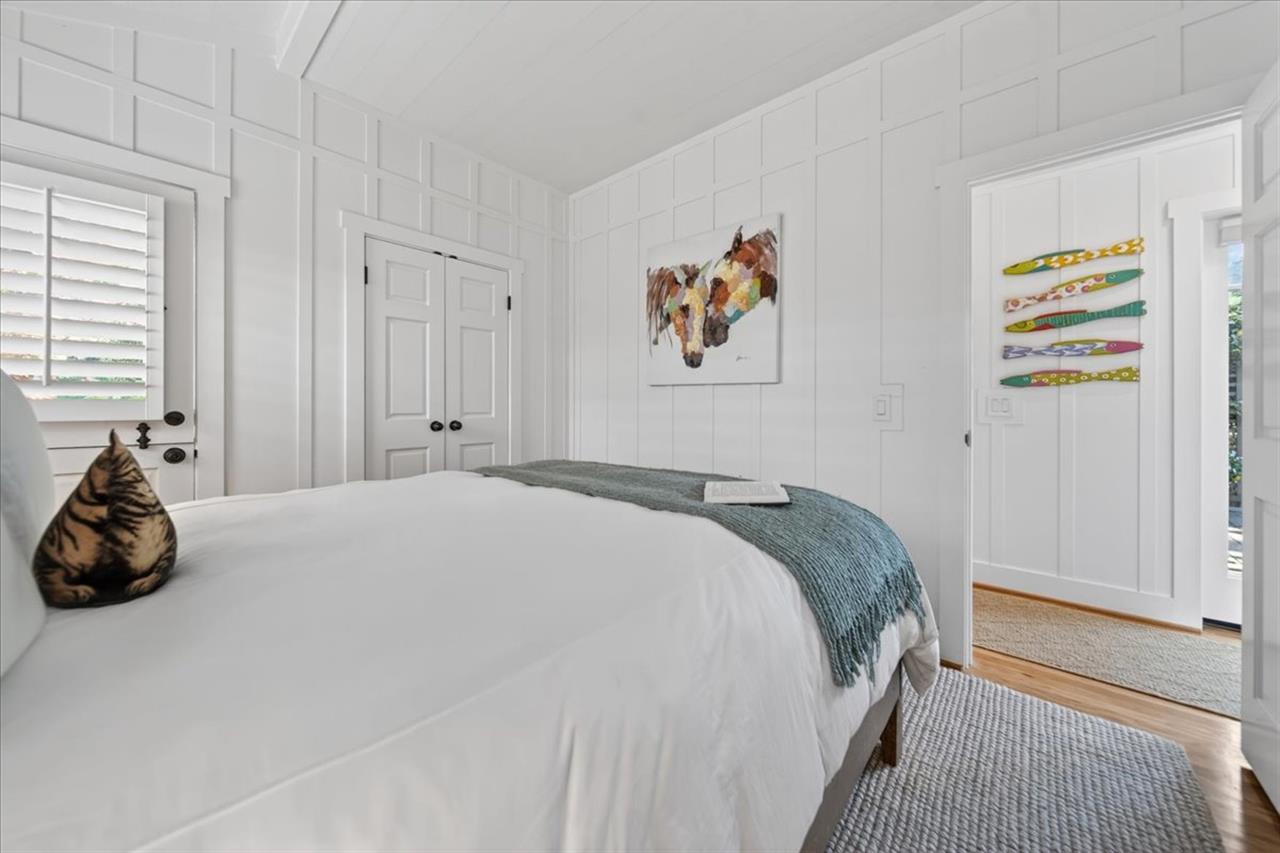Downstairs Bedroom 3 has a Queen Bed