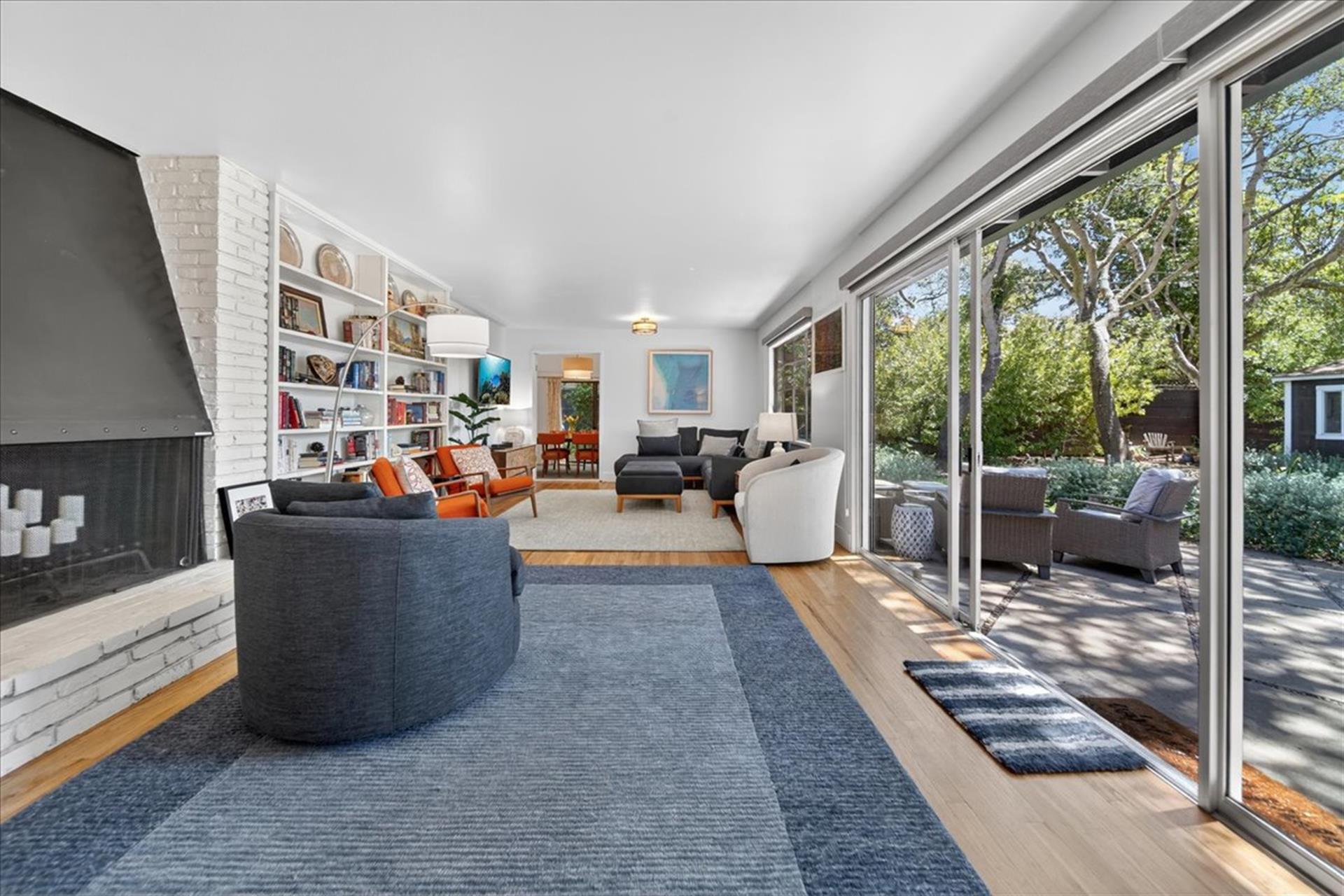 Living Room has a Decorative Fireplace with Candles